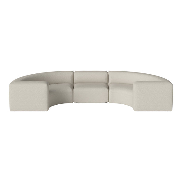 Curved sectional sofa in soft beige fabric with a textured pattern, ideal for modern living spaces.