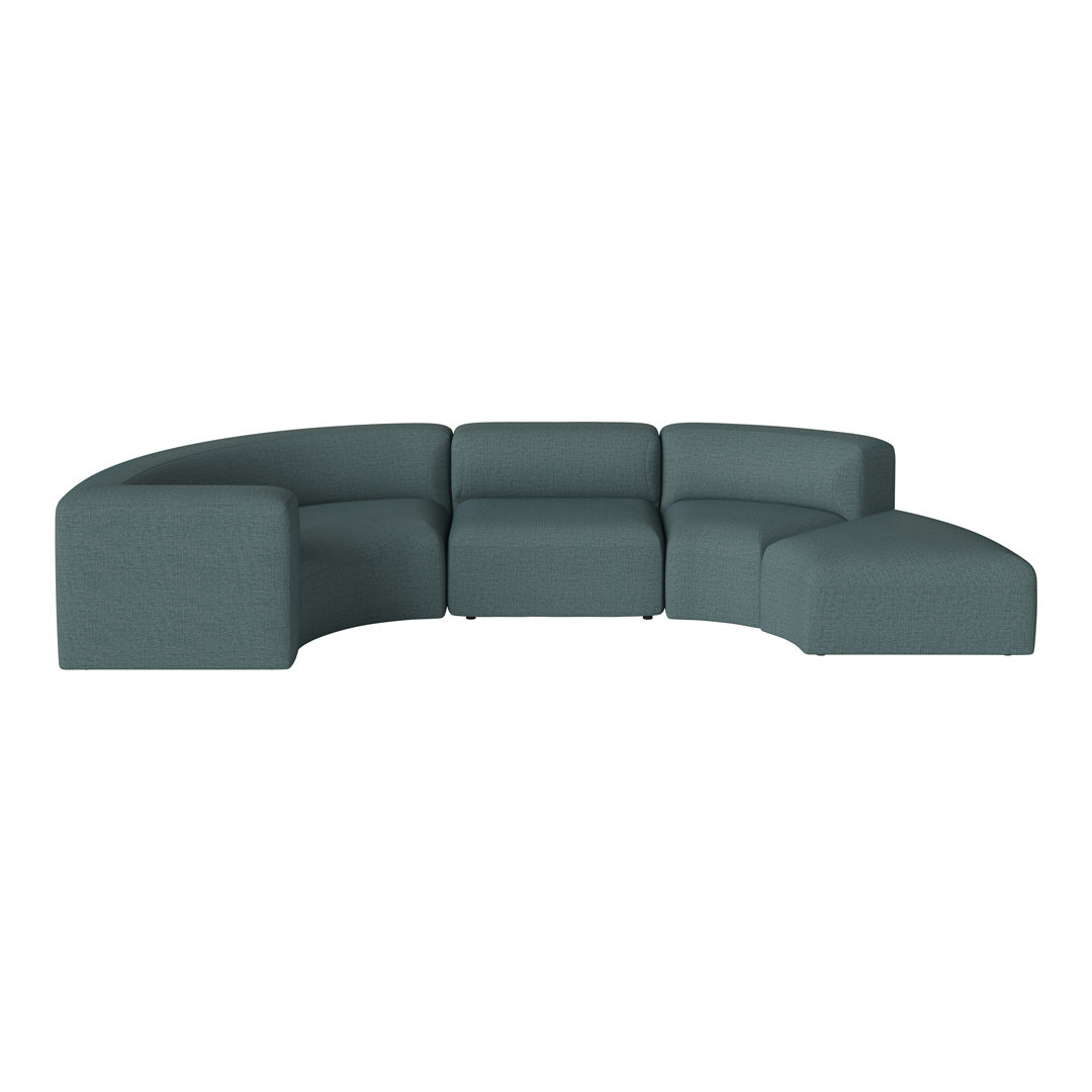 Curved sectional sofa in soft teal fabric, featuring a textured pattern and minimalist design. Perfect for modern decor.