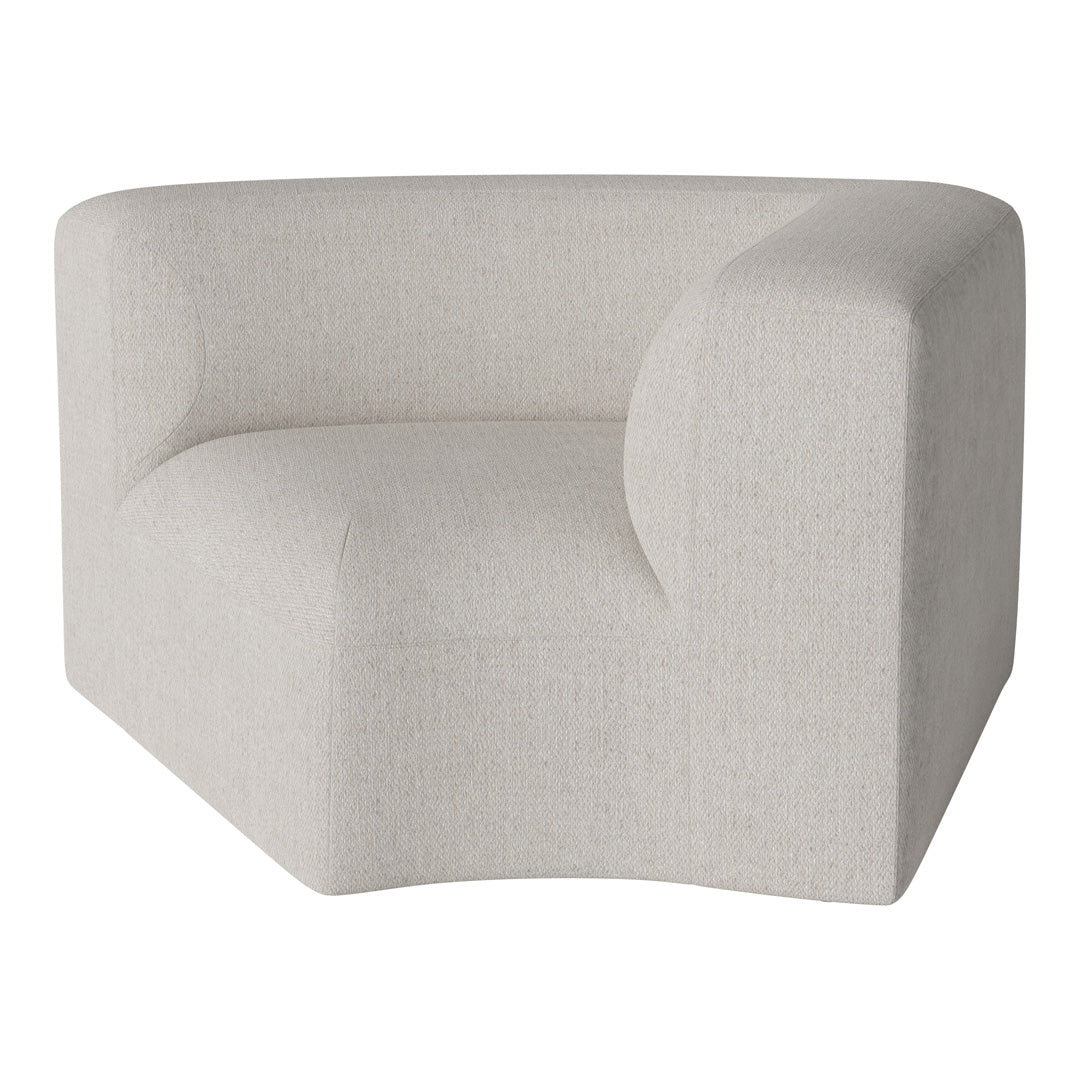 Cream-colored curved chair with a soft, textured fabric and subtle pattern for a modern look.