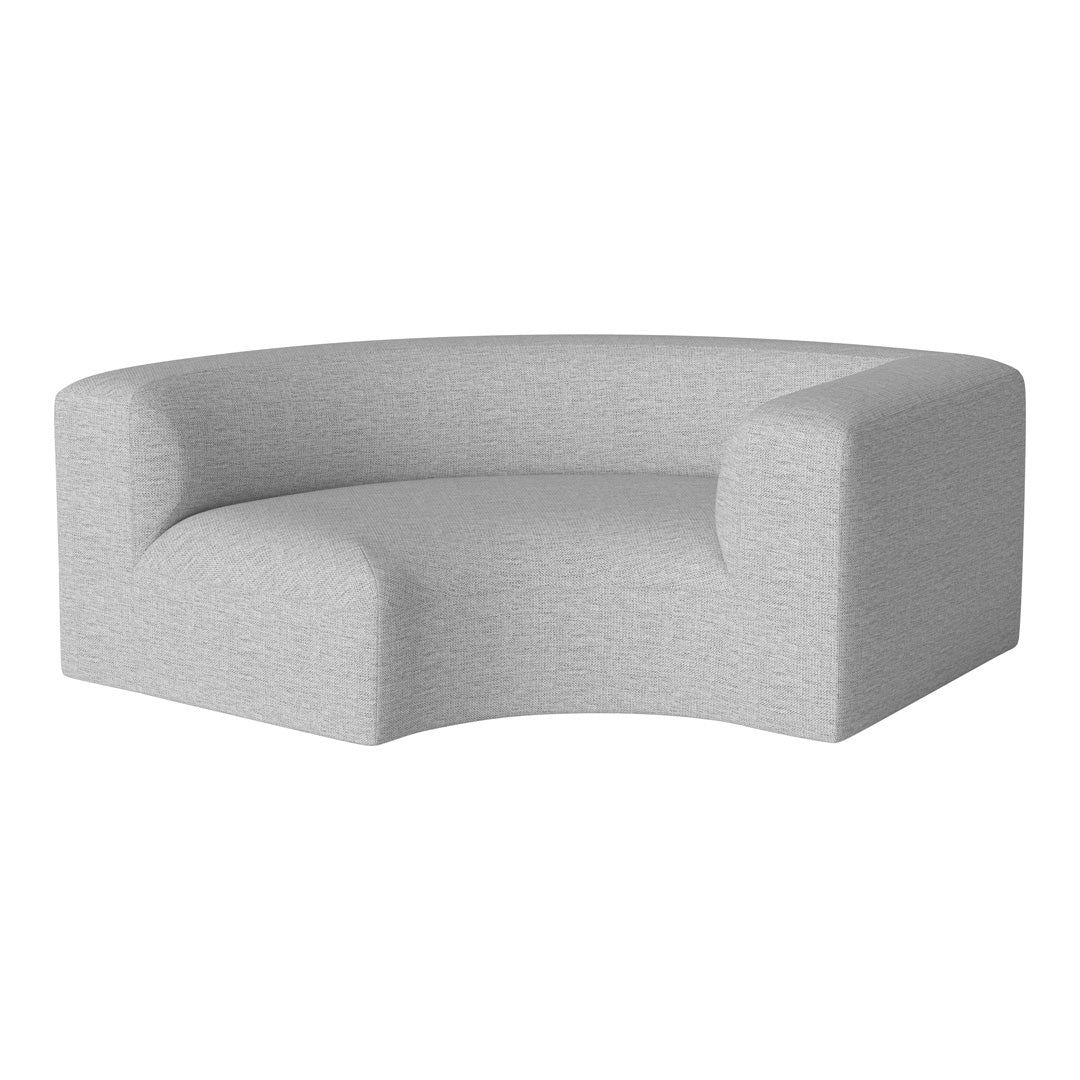 Curved gray sofa with a textured pattern, ideal for modern living spaces. Soft, neutral color enhances any decor.
