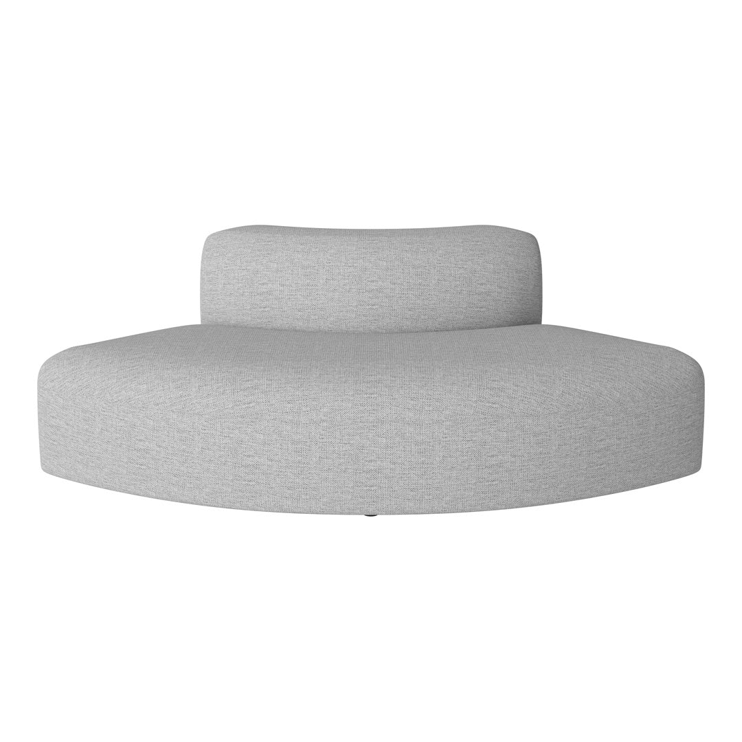 Grey curved sofa with a soft textured fabric, featuring a minimalist design and clean lines, perfect for modern decor.