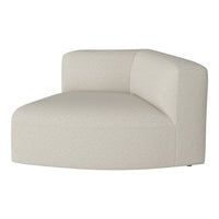 Cream textured corner chair with a minimalist design in neutral tones, ideal for modern living spaces.