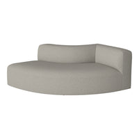 Light gray curved sofa with a subtle textured pattern. Modern and minimalist design perfect for any space.