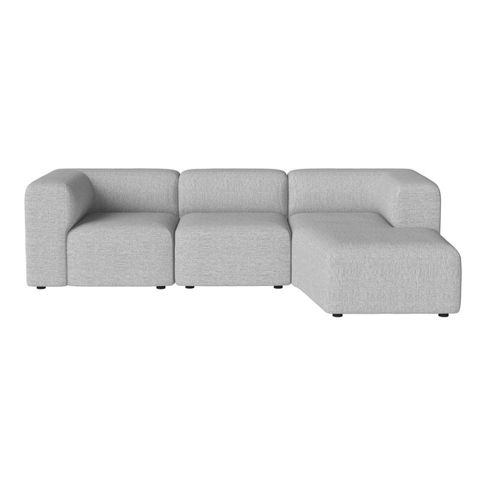 Light gray sectional sofa with a textured fabric and modern, minimalist design. Ideal for contemporary living spaces.