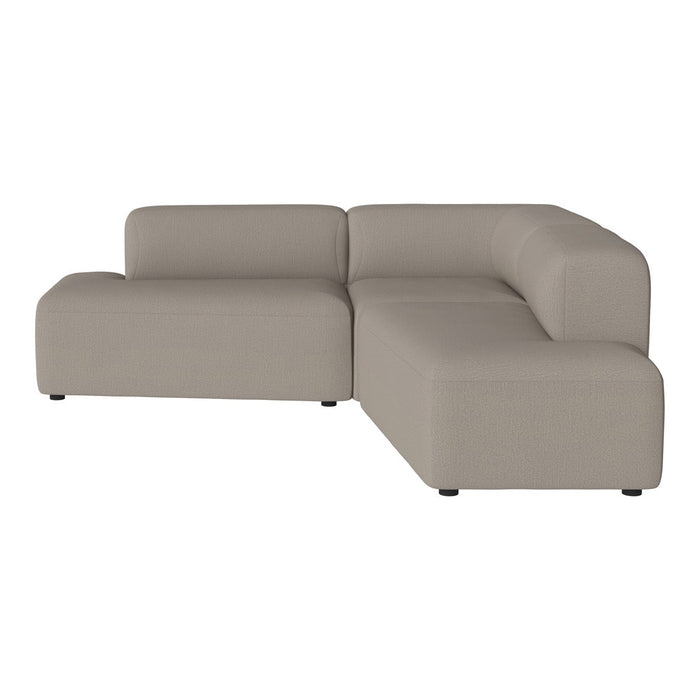 Stylish sectional sofa in a soft beige hue with a modern smooth design and clean lines. Perfect for contemporary decor.
