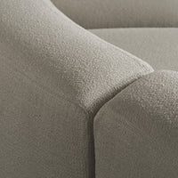Gray textured fabric with a subtle woven pattern, showcasing a modern and minimalist design.