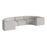 Light gray curved sofa with a smooth texture, featuring minimalist, modern design and soft lines.