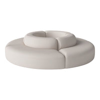 Round cream sofa with smooth contours and soft, neutral fabric, ideal for modern and minimalist decor.
