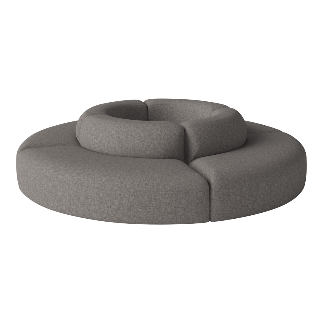 Round gray sectional sofa with a soft, textured fabric and modern design, perfect for contemporary decor.
