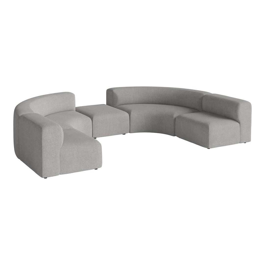 Curved modular sofa in soft light gray fabric, featuring a smooth, contemporary design.