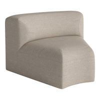 Beige upholstered chair with a smooth, textured pattern and soft curves. Ideal for modern, minimalist decor.