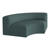 Curved teal sofa with a textured fabric pattern, adding a modern touch to any living space.