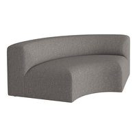 Curved gray sofa with a textured fabric pattern, adding a modern touch to any living space.