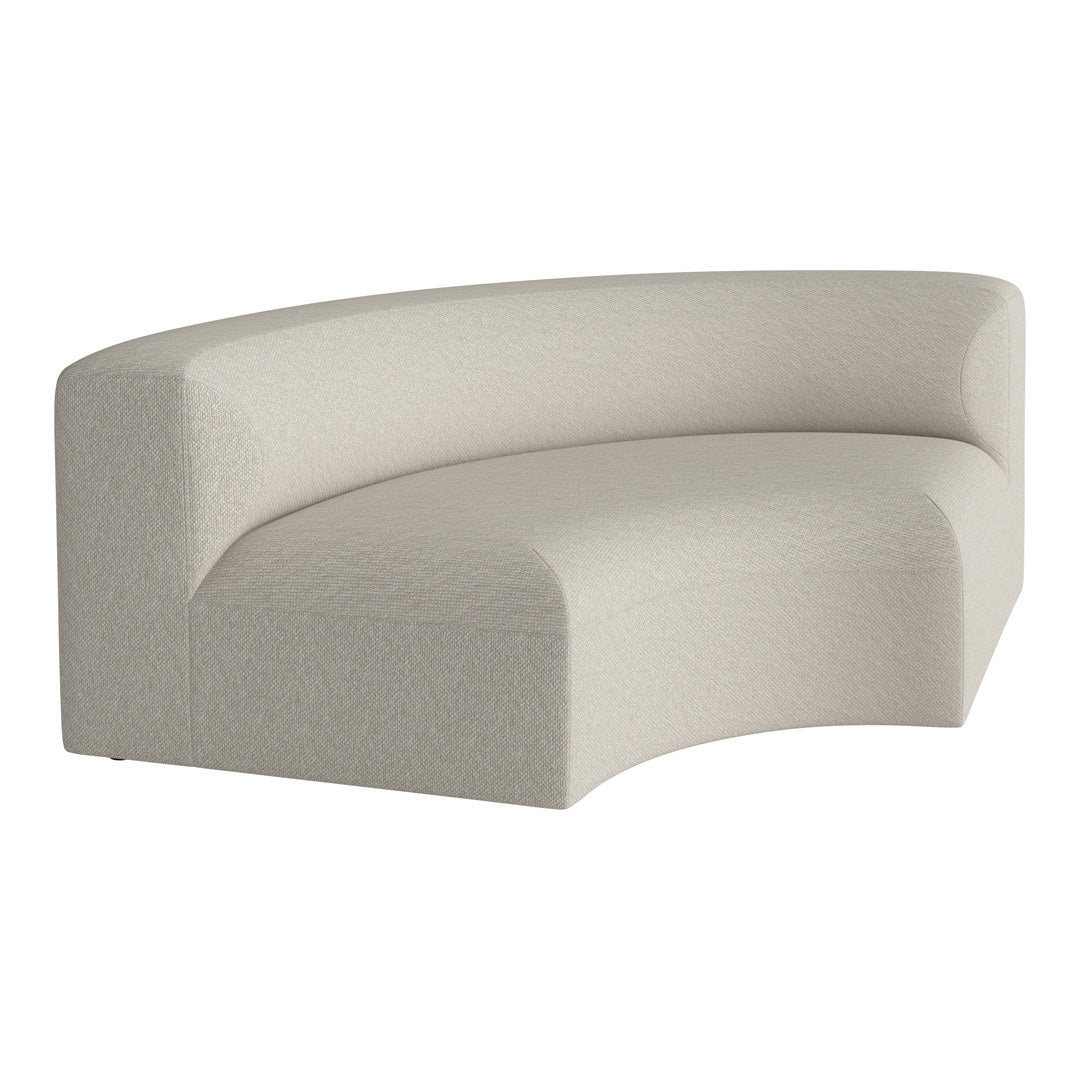Curved sofa in soft beige fabric with a subtle, textured pattern for a modern, minimalist look.