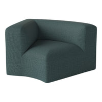 Textured teal armchair featuring a modern, minimalist design perfect for contemporary interiors.
