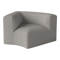 Stylish gray corner chair with a textured fabric and modern sculptural design, perfect for contemporary decor.