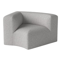 Gray textured corner chair with a minimalist design, featuring a subtle woven pattern and soft edges.