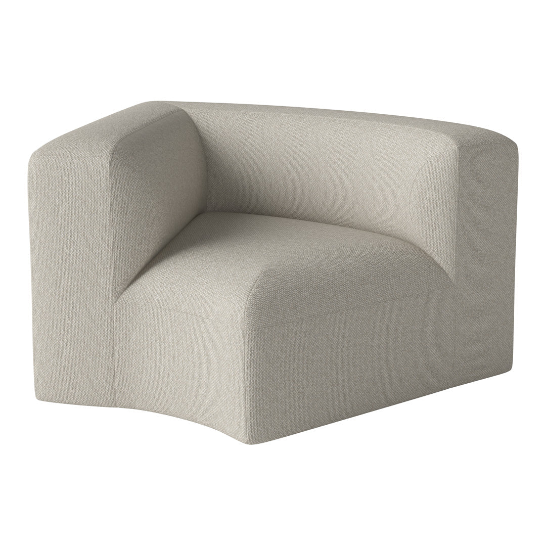 Light gray corner chair with a textured fabric pattern, featuring a modern, minimalist design and soft contours.