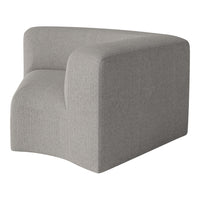 Textured light gray corner chair with a soft, muted finish and rounded edges, perfect for modern decor.
