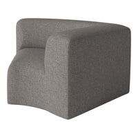 Gray upholstered corner chair with a textured fabric pattern for modern decor.