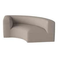 Curved beige sofa in a subtle textured fabric, perfect for modern living spaces.