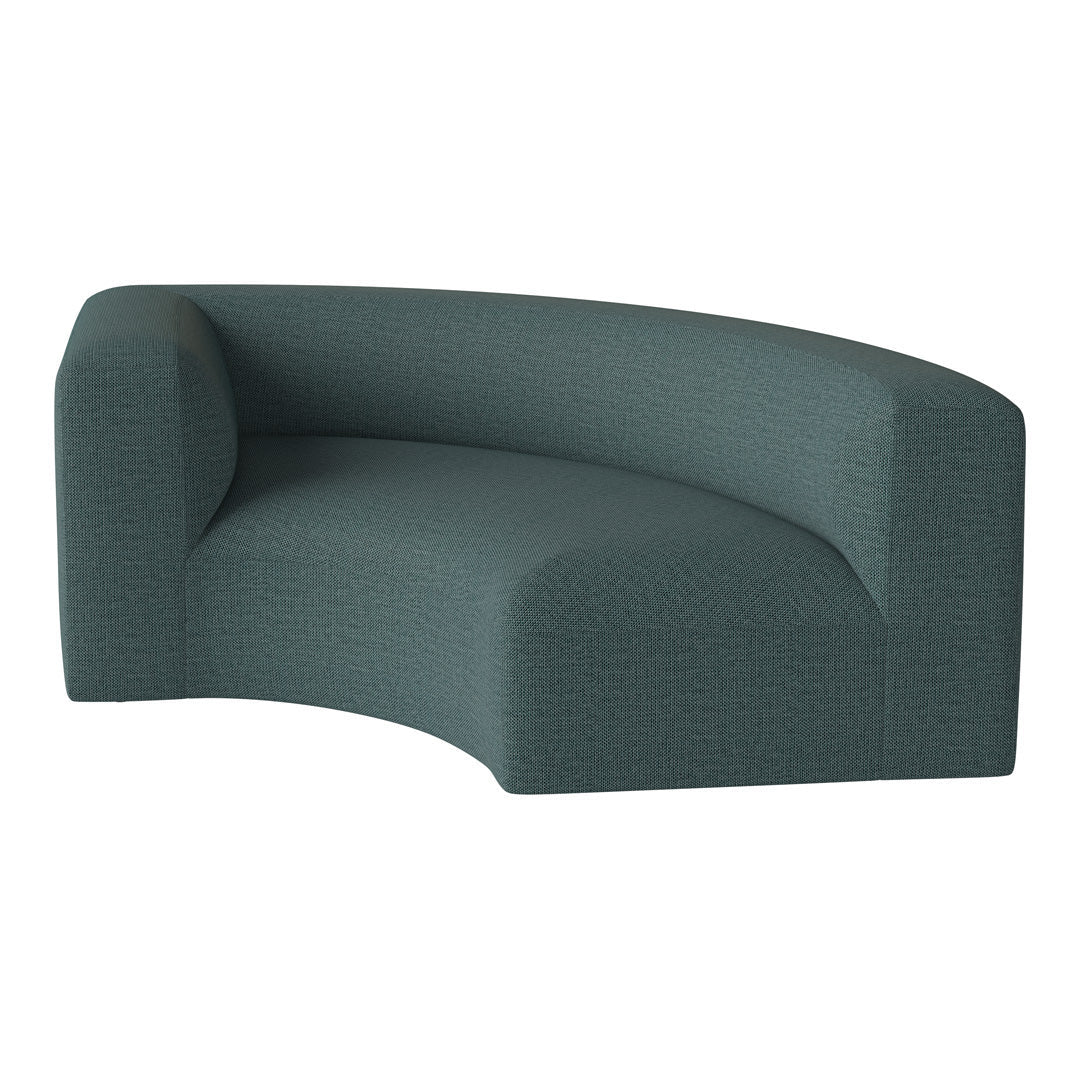 Curved sofa in a deep teal color with a subtle textured pattern for a modern touch.