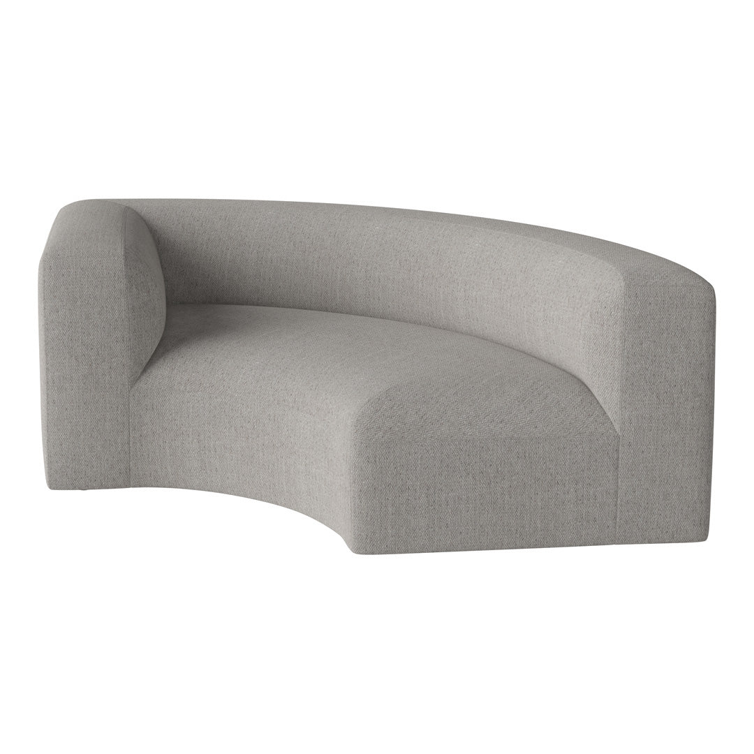 Light grey curved sofa with a smooth, textured fabric finish and minimalist design. Ideal for modern interiors.