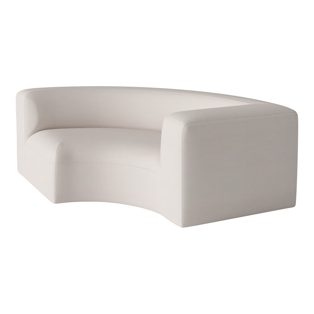 Curved white sofa with a soft, textured fabric, featuring a minimalist design and smooth edges.