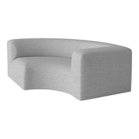 Curved sofa in soft light gray fabric with a subtle textured pattern, perfect for modern interiors.