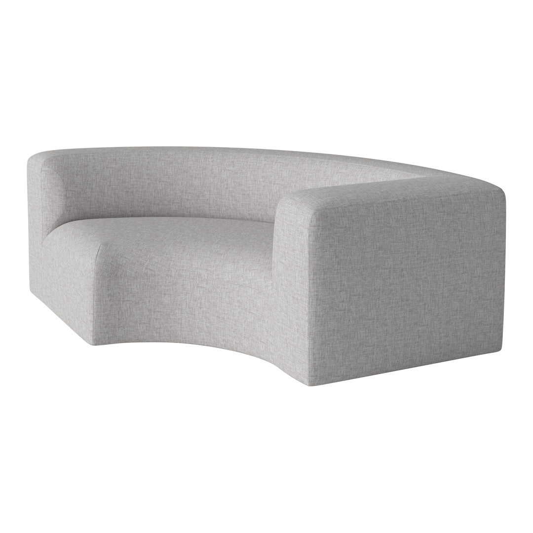 Curved grey sofa with a subtle textured pattern, perfect for modern interiors. Ideal for minimalist living spaces.