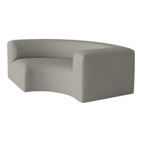 Curved gray sofa with a subtle textured pattern, ideal for modern living spaces.