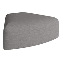 Gray textured triangular ottoman with a modern, minimalist design. Perfect for contemporary spaces.