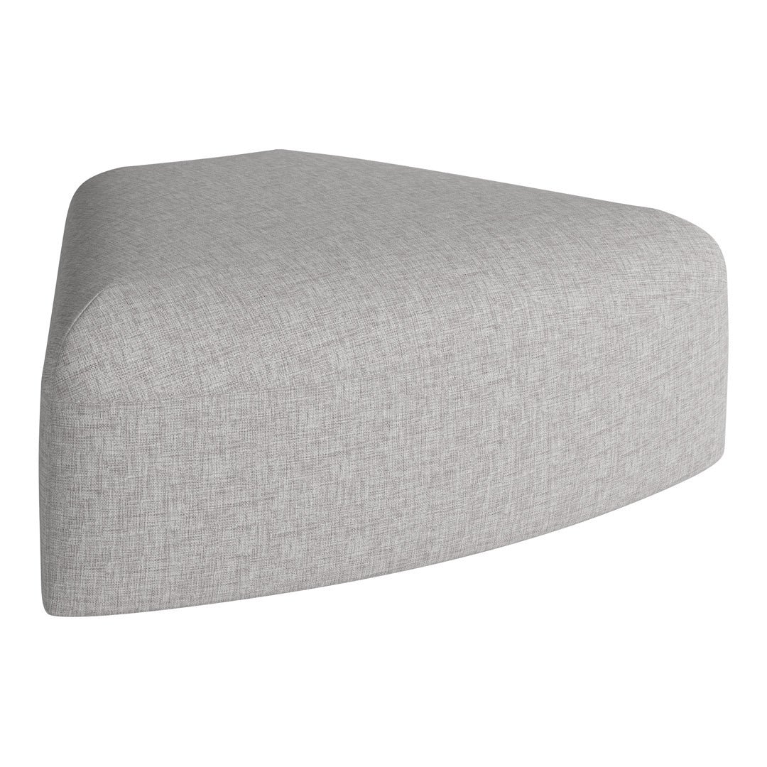 Light gray triangular ottoman with a subtle textured pattern, perfect for contemporary decor.