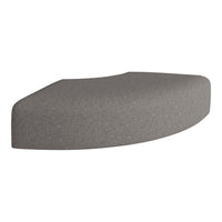 Gray upholstered cushion with a textured pattern, featuring a modern curved design for stylish seating.