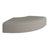 Curved cushion in light gray fabric with subtle textured pattern for modern decor.