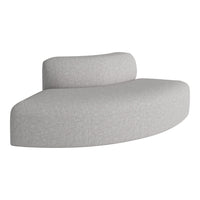 Light grey curved sofa with a textured fabric surface, perfect for modern decor.