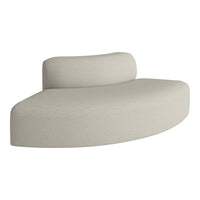 Curved beige sofa with a textured, soft fabric for a modern and stylish look. Ideal for contemporary interiors.