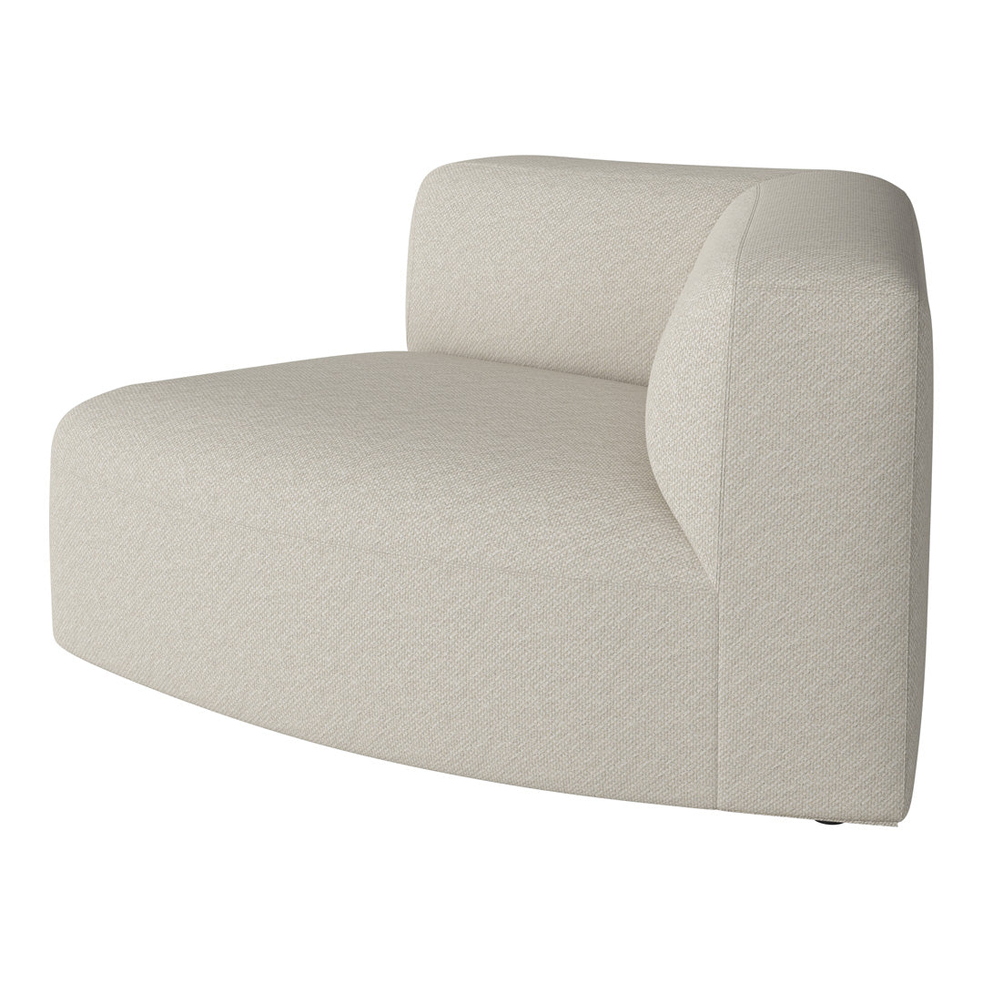 Soft beige curved sofa with a subtle textured pattern, perfect for modern living spaces.