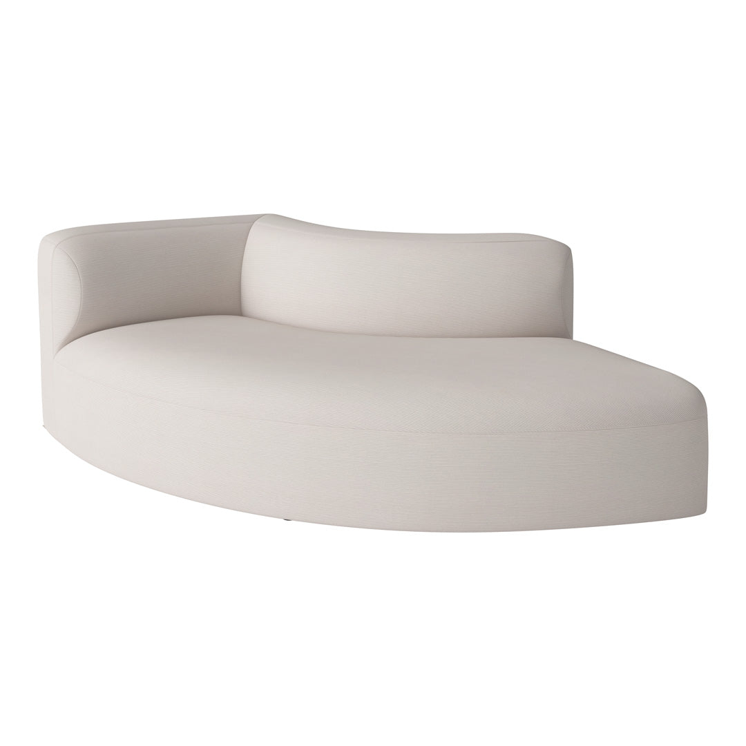 Beige curved sofa with subtle textured pattern, ideal for contemporary living spaces.