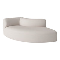 Beige curved sofa with subtle textured pattern, ideal for contemporary living spaces.