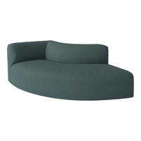 Curved teal sofa with a textured, patterned fabric, perfect for modern living spaces.