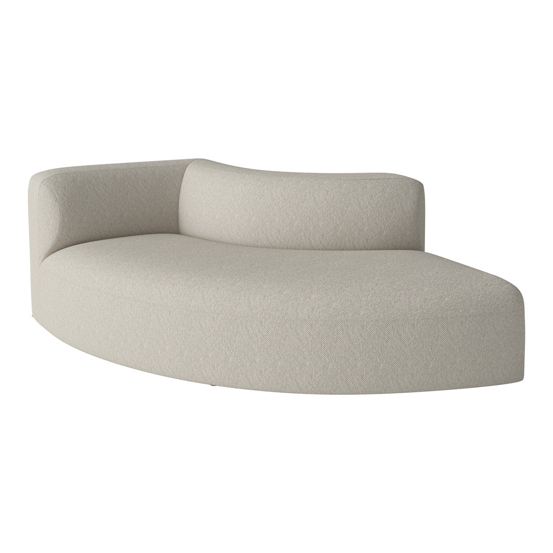 Curved sofa in soft beige fabric with subtle textured pattern, ideal for modern living spaces.