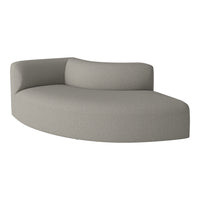 Curved couch in soft grey fabric featuring a subtle woven pattern for a modern touch. Perfect for contemporary interiors.