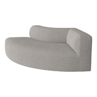 Curved gray sofa with a soft, textured fabric and minimalistic design, perfect for modern living spaces.