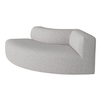 Curved gray sofa with a subtle textured pattern, adding a modern touch to any living space.