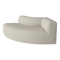 Light beige curved sofa with a subtle textured fabric, minimalist design, perfect for modern interiors.