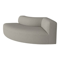 Light gray curved sofa with textured pattern, offering a modern and minimalist design. Ideal for contemporary spaces.