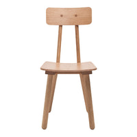 Lightly stained wood chair with a smooth finish and minimalistic design. Clean lines and natural tones.