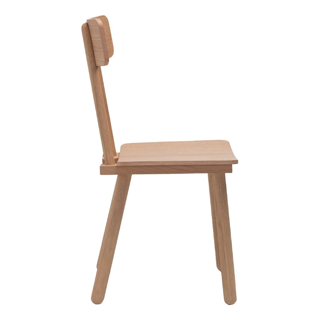 Natural wood chair in light beige with a smooth, minimalist design and subtle grain pattern. Ideal for modern spaces.