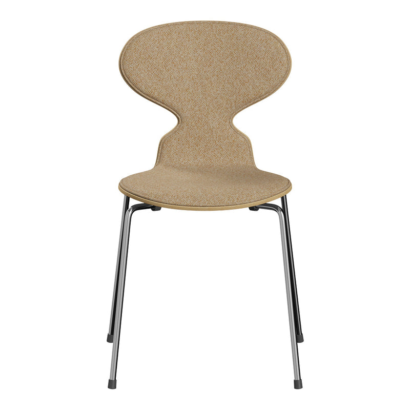 Natural sandy beige chair with a smooth, curved design and sleek silver legs, perfect for modern decor.